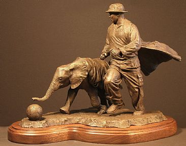 Football Buddies - Orphaned African elephant with keeper by Douglas Aja