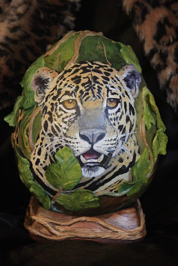 "jEGGuar" - Young jaguar painted on an oval plaster egg by Kitty Harvill